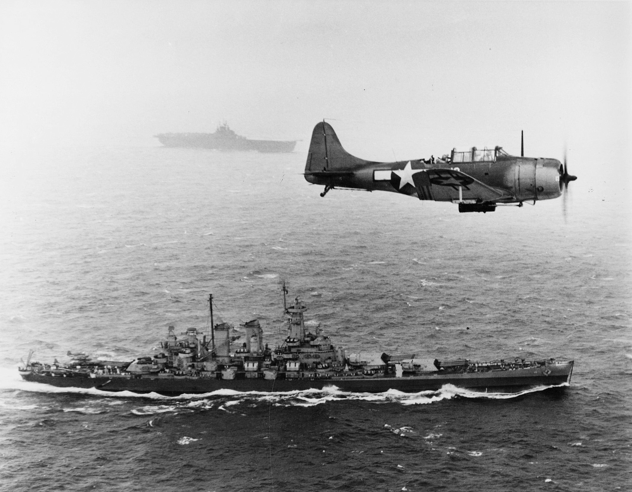 SBD_VB-16_over_USS_Washington_1943